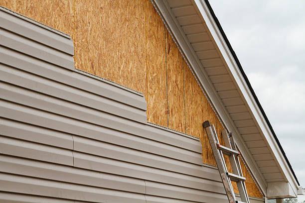 Professional Siding Repair technician working in Newcomerstown, OH
